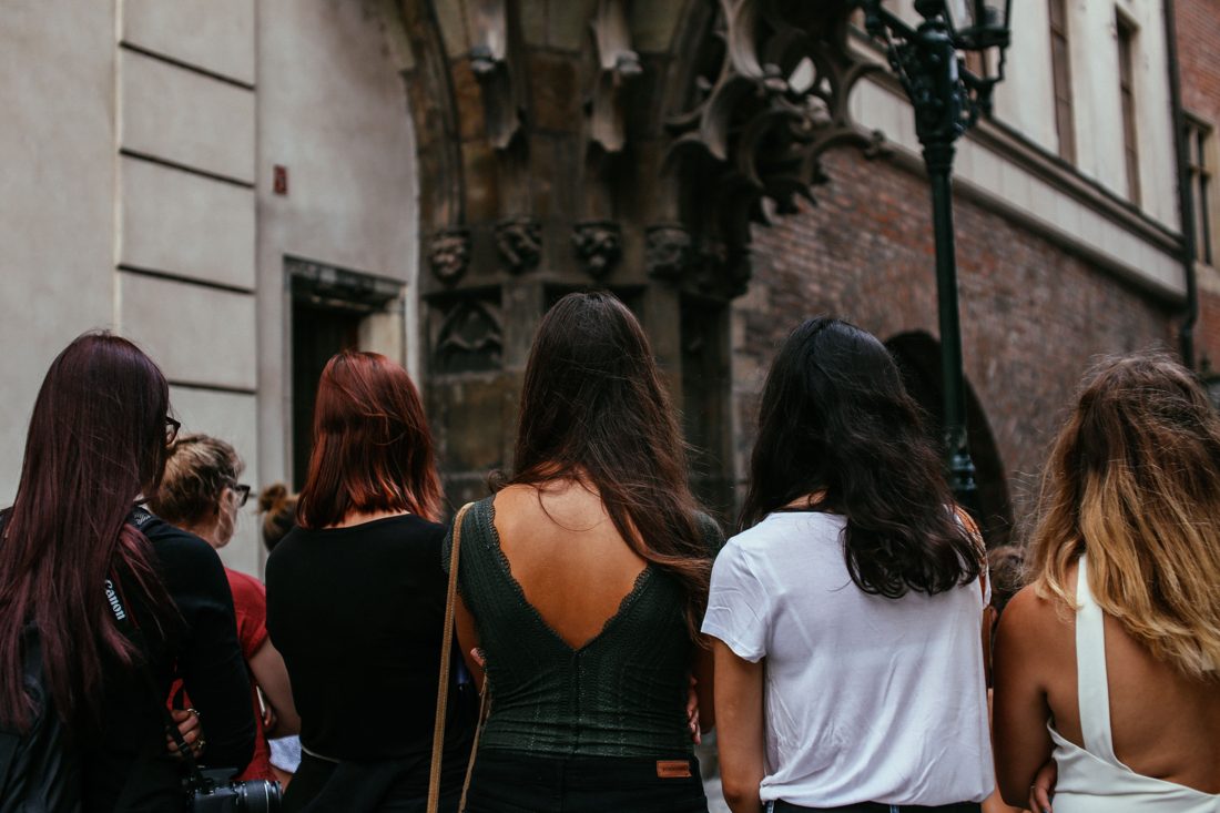 A group of friends on a walk through the city